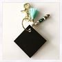 NOLA or Nowhere Stamped Wooden Keychain with Tassel